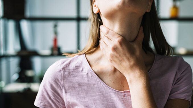 close-up-woman-s-hand-touching-her-neck_23-2147953204